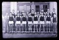 Slats Gill, the OSC basketball team, and Bert Grayson, circa 1960