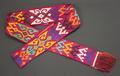 Belt of woven violet wool with geometric designs composed of stepped squares