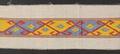 Textile Panel of white muslin with a tapestry woven band in golden yellow, blue and red