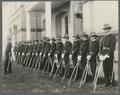 Cadet officers with sabres in front of the Administration Building