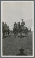 Horseback cadets with artillery in background, circa 1920