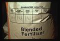 Closeup of fertilizer bag, Oregon, 1975