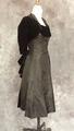 Dress ensemble of coal grey taffeta faille with very faint star-burst design and black velvet