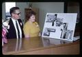 Dr. David L. Crawford and Joan (Bagley) Crawford with photos of old seafoods laboratory at Seafoods Laboratory dedication, Oregon State University, Astoria, Oregon, circa 1965