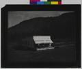 Rondowa Hotel and post office at Rondowa, OR. Isolated building with people on awning-covered porch. Hillside in background. (recto)