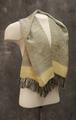 Man's scarf of blues and cream patterned silk or rayon with fringe at ends