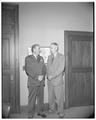 Colonel Leroy Heston, professor of Air Science, with President Strand