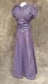 Evening dress of purple rayon faille taffeta with clusters of tiny stylized star flowers design