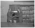 Albert Arust of Portland presents 43 volumes of The Lumberman to Forestry Dean Walter McCulloch, Fall 1961