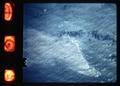 Aerial view of ocean outfall using blue filter, circa 1970
