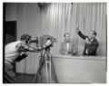 A televised chemistry demonstration by OSC professors Max Williams (left) and Wendall Slabaugh